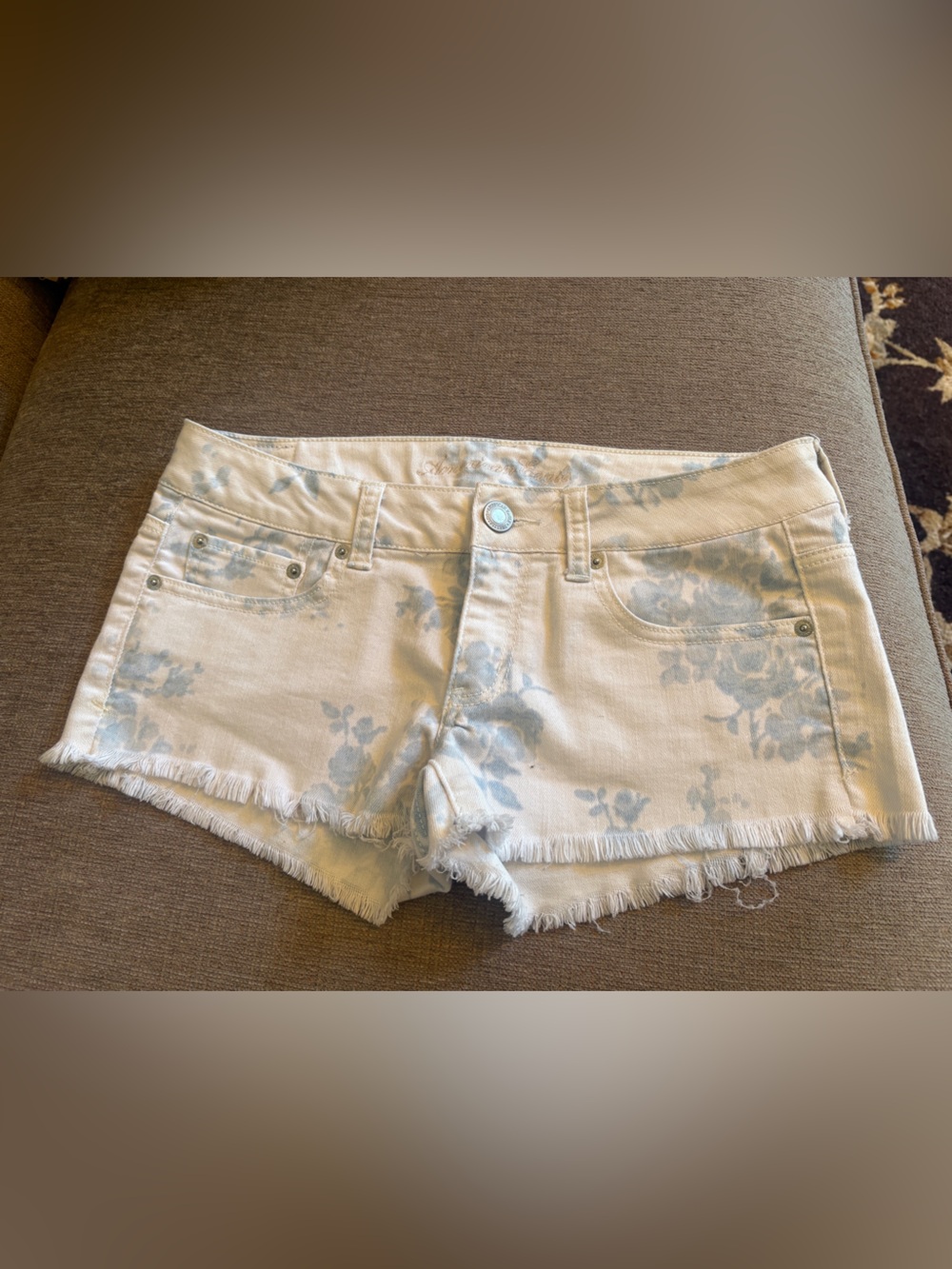 American Eagle Outfitters White Denim Shorts with Light Blue Floral Print